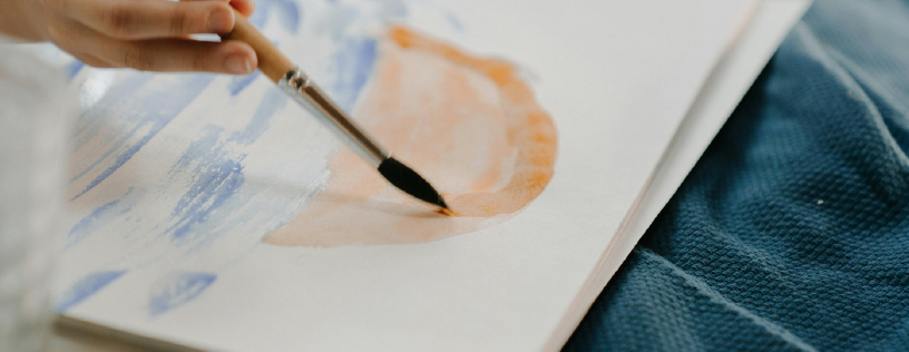 Photo of a person watercolor painting.